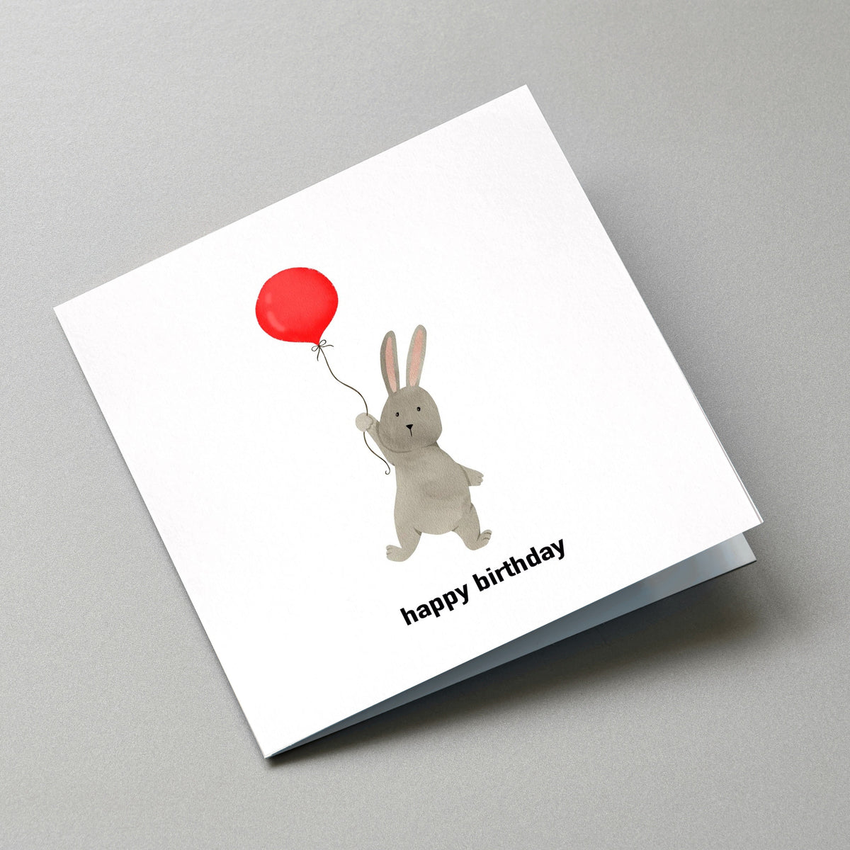 Rabbit Birthday Card, With Kraft Envelope & Gift Tags - Angled Card View